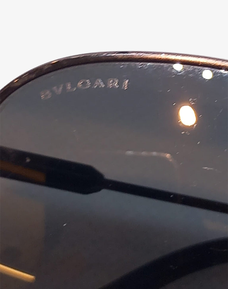 Occhiali da sole Bulgari in metallo scuro