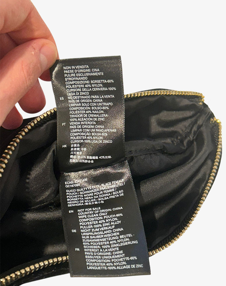 Pochette Gucci Beauty nera effetto velluto con zip anni 2010
