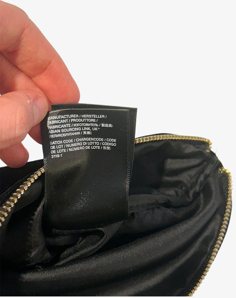Pochette Gucci Beauty nera effetto velluto con zip anni 2010